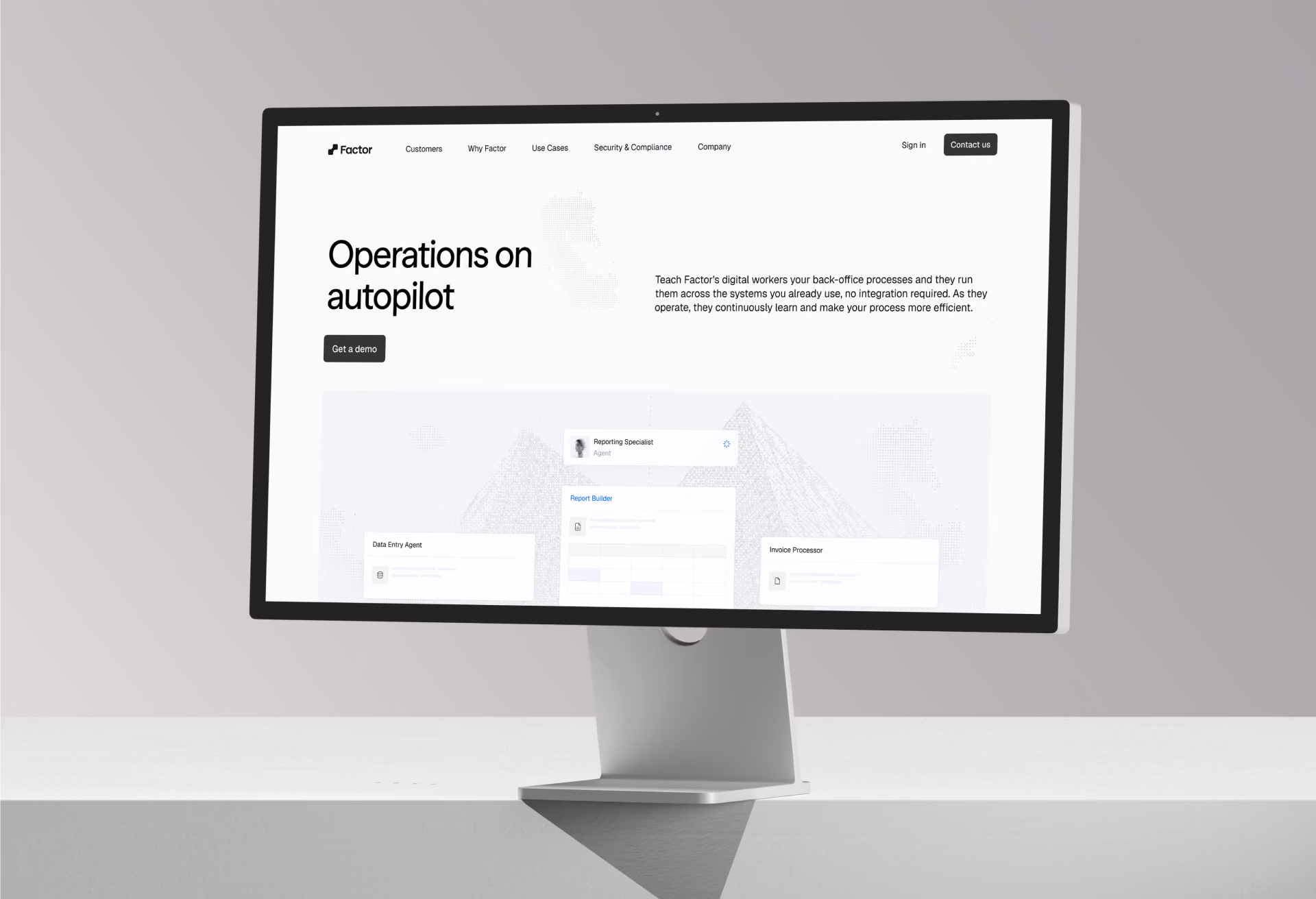 Factor website displayed on a desktop monitor